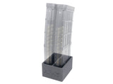 two ar-15 5.56 magazines placed in magazine holder