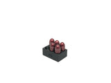 snap cap holder with .45 cal snap caps in it