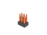 snap cap holder with 5.56 snap caps in it