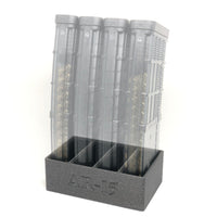 Four magazine mag holder with four AR-15 magazines inserted