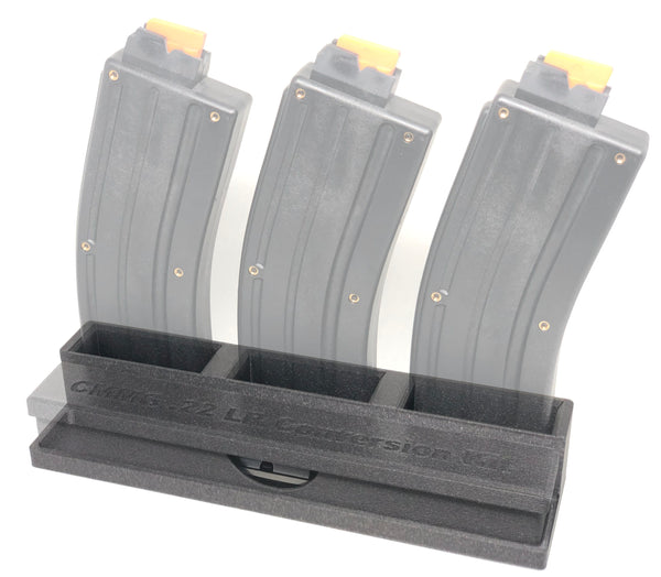 Holder for CMMG 22LR conversion kit case and magazines with a case and magazines in it