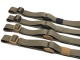 Four Ranger Green TOIM customizable quick adjust two point slings with a mixutre of ranger green, coyote brown, and black pull tabs, hardware, and elastic keepers