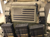 Close up of Crye SPC plate carrier with placard extenders installed