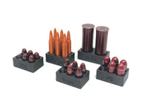 snap cap holders with 5.56, 12ga, .45, 9mm, and .380 snap caps in them