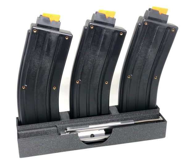 cmmg .22 lr conversion kit bolt and magazines placed in a plastic holder