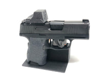 sig p365 on gun stand with dust cover on holosun 507k or 407k optic and magazines side view