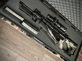 Case for CMMG .22 LR conversion kit bolt open with bolt carrier group on top of it all in a pelican case with AR-15 in it